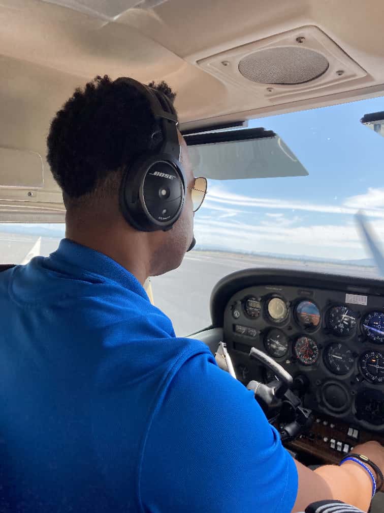 Student pilot at the controls of a small aircraft